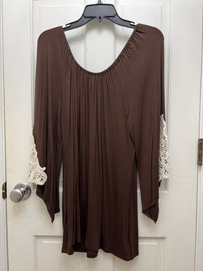 The Hanger Brown Tunic with Cream Crochet Sleeve Accents